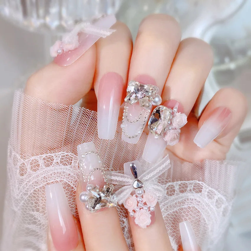 Blush rose faux ongles nœud papillon diamant perle conception 3D presse sur les pointes d'ongles avec bord lisse inoffensif ongles femme faux ongles à faire soi-même