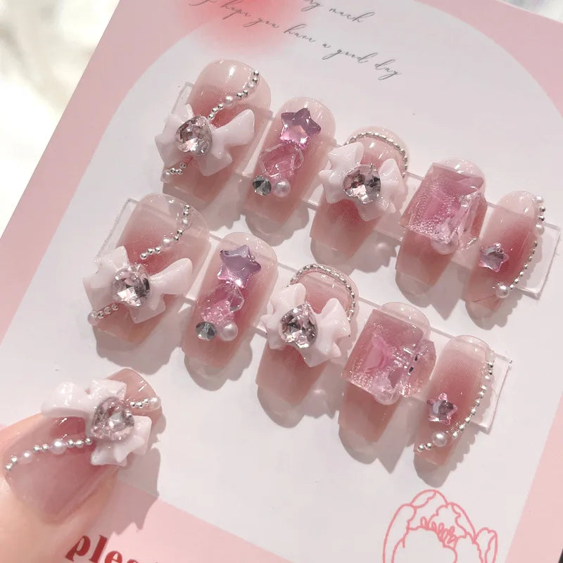 Blush rose faux ongles nœud papillon diamant perle conception 3D presse sur les pointes d'ongles avec bord lisse inoffensif ongles femme faux ongles à faire soi-même